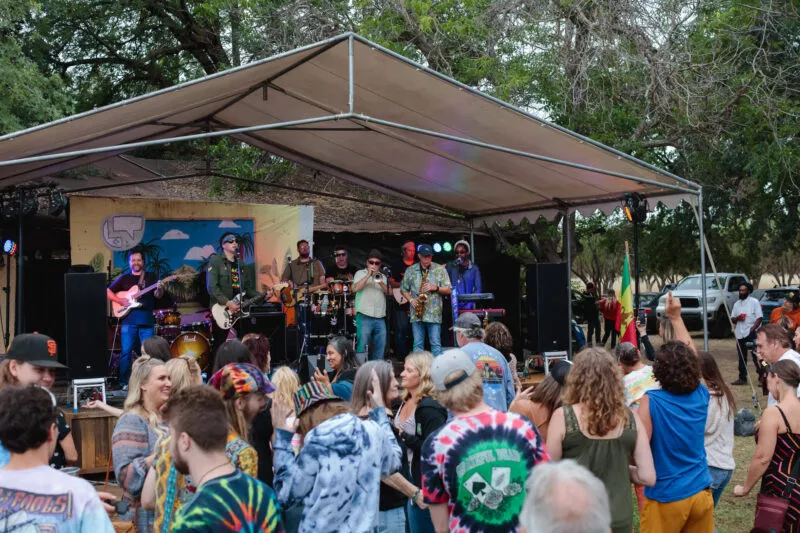 People dancing to Dylan's Dharma at Lambstock, 2022.